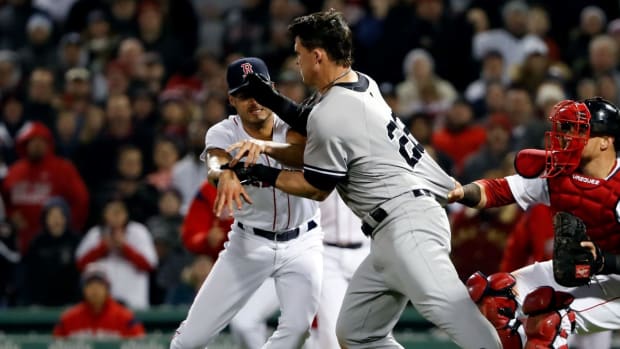 Boston Red Sox reliever Joe Kelly; New York Yankees utility man Tyler Austin